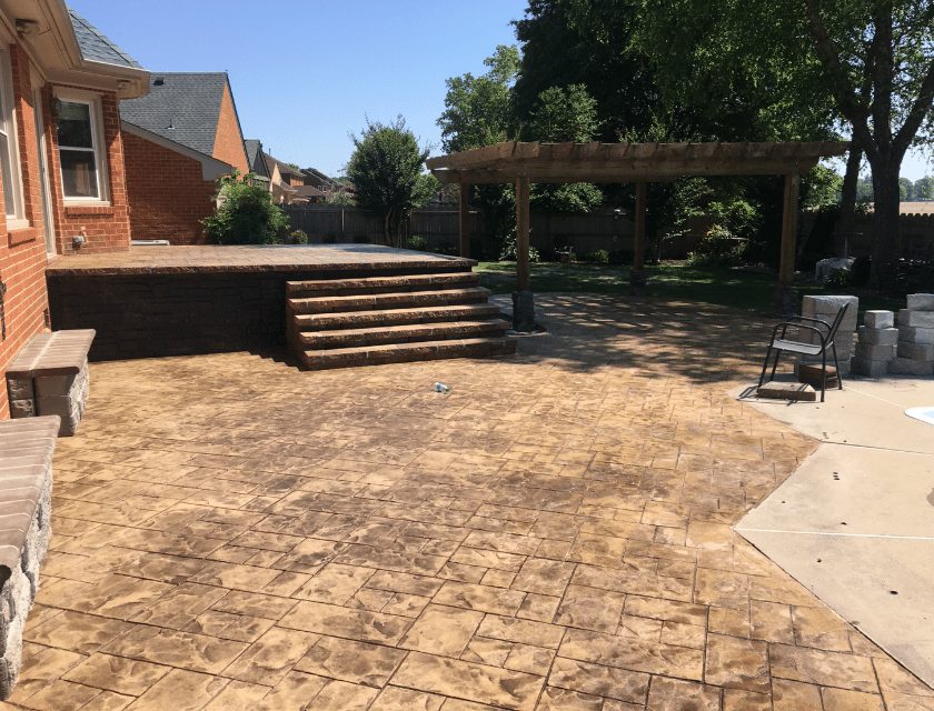 Stamped patio with steps & deck